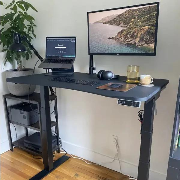 adjustable sit stand desk matte lux black desktop with laptop stand and one monitor arm