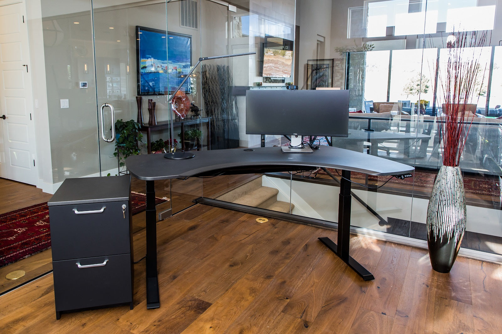 L Shaped Standing Desk shown in glass office