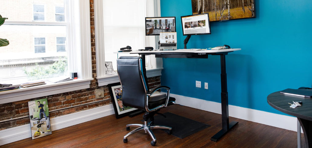 Sit-Stand Desk Raised Blue Background 